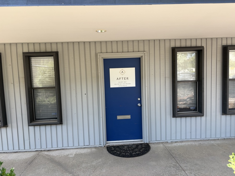 After sign on the office door in Arvada