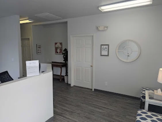 Reception desk and waiting area inside the Mesa office