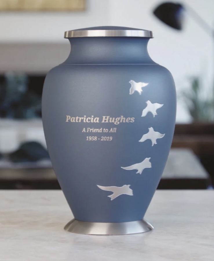 Blue urn with silver birds and a personalized engraving